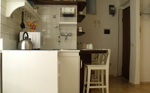 Studio Moremi': Costruzione, Cabinetry, Interior Design, Pavimento, Pavimentazione, Elettrodomestico Da Cucina, Cucina, Legna, Gas, Tavolo