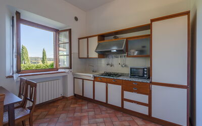 rocche-di-valiano-chianti-castelnuovo-berardenga-multiproprietà-geranio-cucina