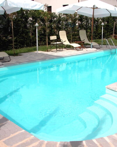 Monastery Guest House: Acqua, Pianta, Piscina, Costruzione, Azzurro, Shade, Rettangolo, Mobili Da Esterno, Albero, Materiale Composito