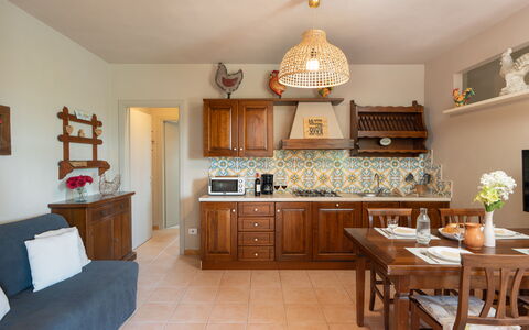 Calanchi Apartments: Mobilia, Interior Design, Legna, Pavimentazione, Cabinetry, Soffitto, Pavimento, Camera, Illuminazione, Cucina
