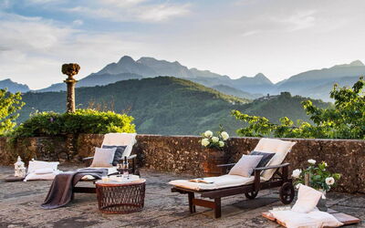 Take in the breathtaking view of North Tuscany's green valley of Garfagnana from the private patio of Villa Raffaelli.