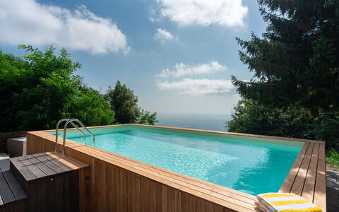 Casa Serra: Acqua, Nube, Cielo, Pianta, Risorse Idriche, Giorno, Piscina, Azzurro, Albero, Shade