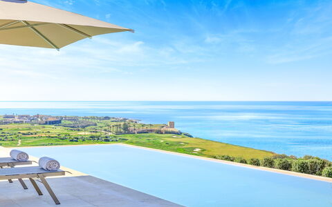 Villa Smeraldo - Sea Front | By Rocco Forte Villas: Cielo, Acqua, Nube, Costruzione, Blu, Azzurro, Casa, Mobili Da Esterno, Pianta, Ombrello