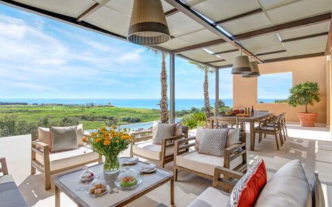 Villa Corallo - Sea Front | By Rocco Forte Villas: Tavolo, Pianta, Cielo, Mobilia, Proprietà, Vaso Di Fiori, Sedia, Azzurro, Pianta Della Casa, Shade
