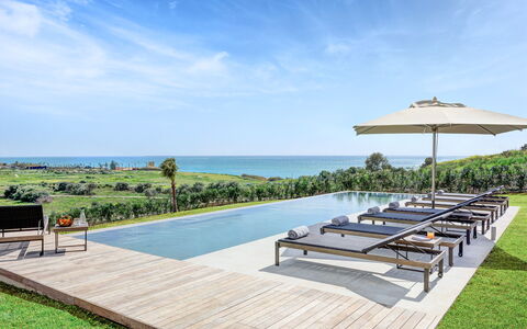 Villa Corallo - Sea Front | By Rocco Forte Villas: Cielo, Nube, Acqua, Pianta, Mobili Da Esterno, Shade, Albero, Località Balneare, Tempo Libero, Eco Hotel