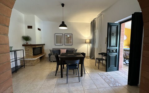 Villa Azzurra: Mobilia, Pavimentazione, Pavimento, Interior Design, Sedia, Illuminazione, Soffitto, Tavolo, Camera, Soggiorno