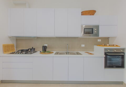 Casa Nonna Netta: Cucina, Elettrodomestico Da Cucina, Controsoffitto, Apparecchio Major, Interior Design, Legna, Cabinetry, Pavimentazione, Cucina Stufa, Stufa