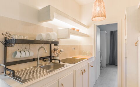 Ville Poggioreale: Interior Design, Controsoffitto, Legna, Cucina, Pavimentazione, Mobilia, Cabinetry, Pavimento, Illuminazione, Casa