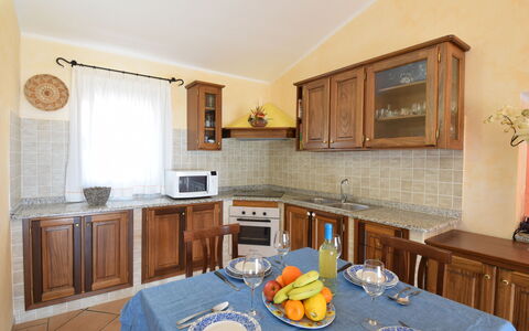Belvedere Apartment Ac, Budoni: Mobilia, Interior Design, Legna, Cucina, Cabinetry, Controsoffitto, Pavimentazione, Soffitto, Camera, Illuminazione