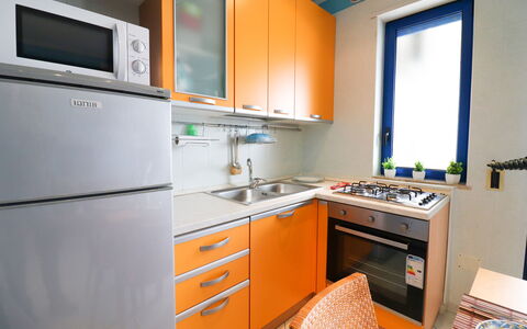 Circe Sea View: Cucina, Elettrodomestico Da Cucina, Apparecchio Major, Controsoffitto, Legna, Lavandino Della Cucina, Cucina Stufa, Cabinetry, Stufa, Interior Design