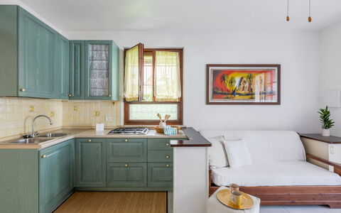 Veranda sul Conero: Mobilia, Interior Design, Cabinetry, Pavimentazione, Legna, Cucina, Controsoffitto, Pavimento, Elettrodomestico Da Cucina, Camera